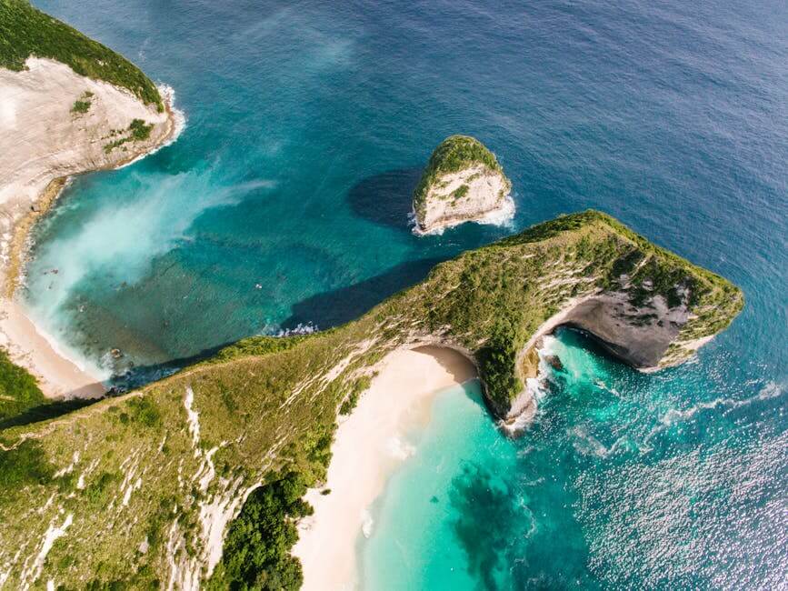 pexels-photo-8332448-8332448-1 Drone shot capturing the breathtaking cliffs and turquoise waters of Nusa Penida, Bali.