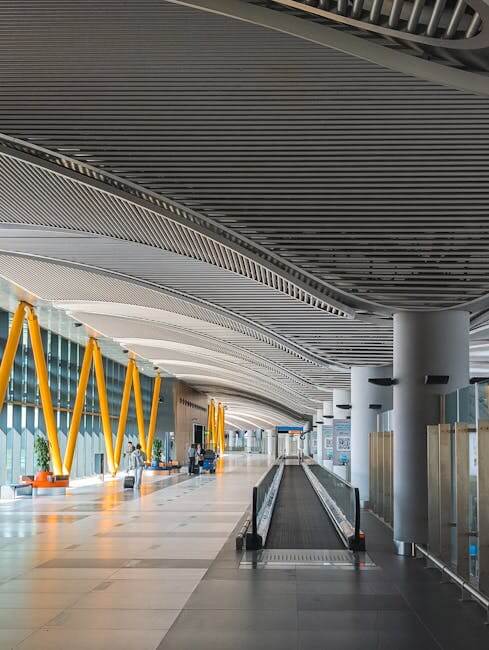 Spacious and elegant terminal at İstanbul Airport, showcasing contemporary architecture with high ceilings and bright natural lighting.