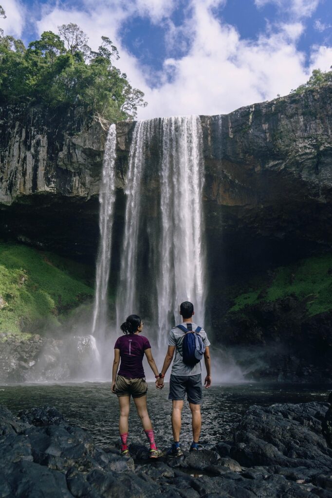 travel, wanderlust, couple, waterfalls, falls, holding hands, backpackers, backpacking, travelers, traveling, adventure, landscape, phone wallpaper, banff, trekking, trip, nature, vacation, journey, alberta, aesthetic wallpaper, iphone wallpaper